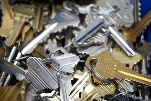 A pile of keys that are all different colors.