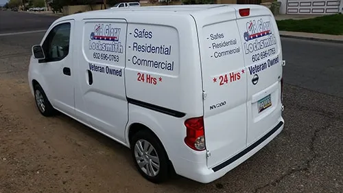 A white van with the words " sales residential commercial jackson owned 2 4 hrs ".