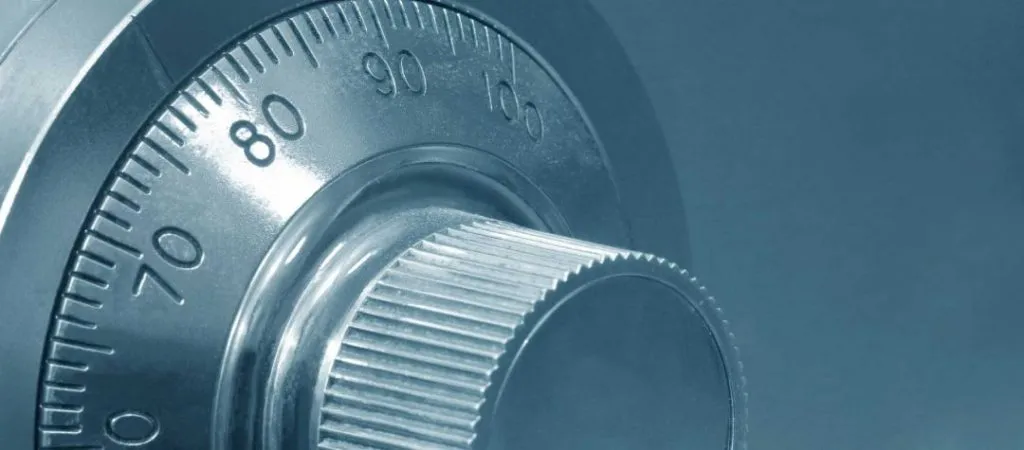 A close up of the dial on a combination lock
